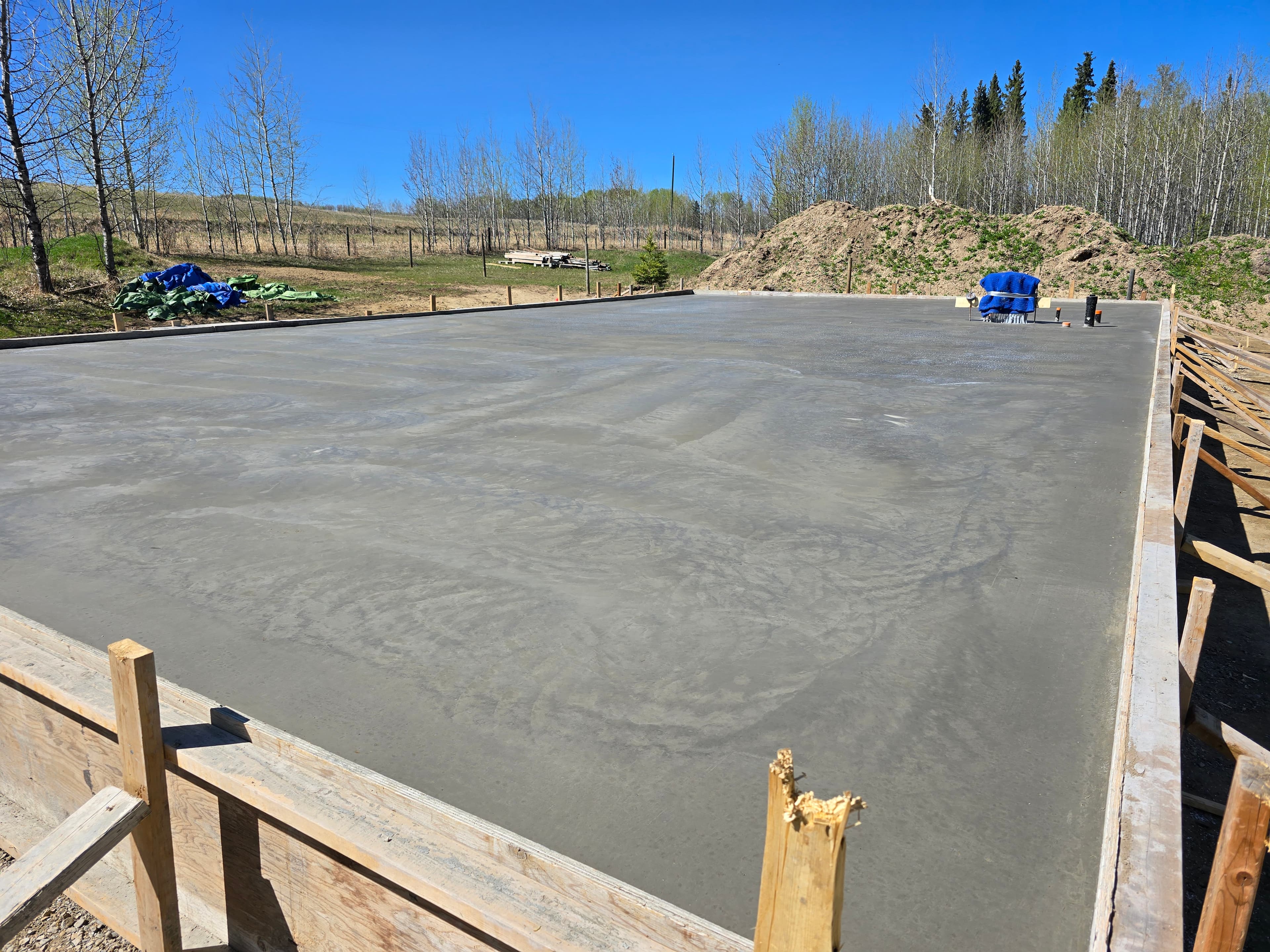 Prepared garage pad and concrete slab project